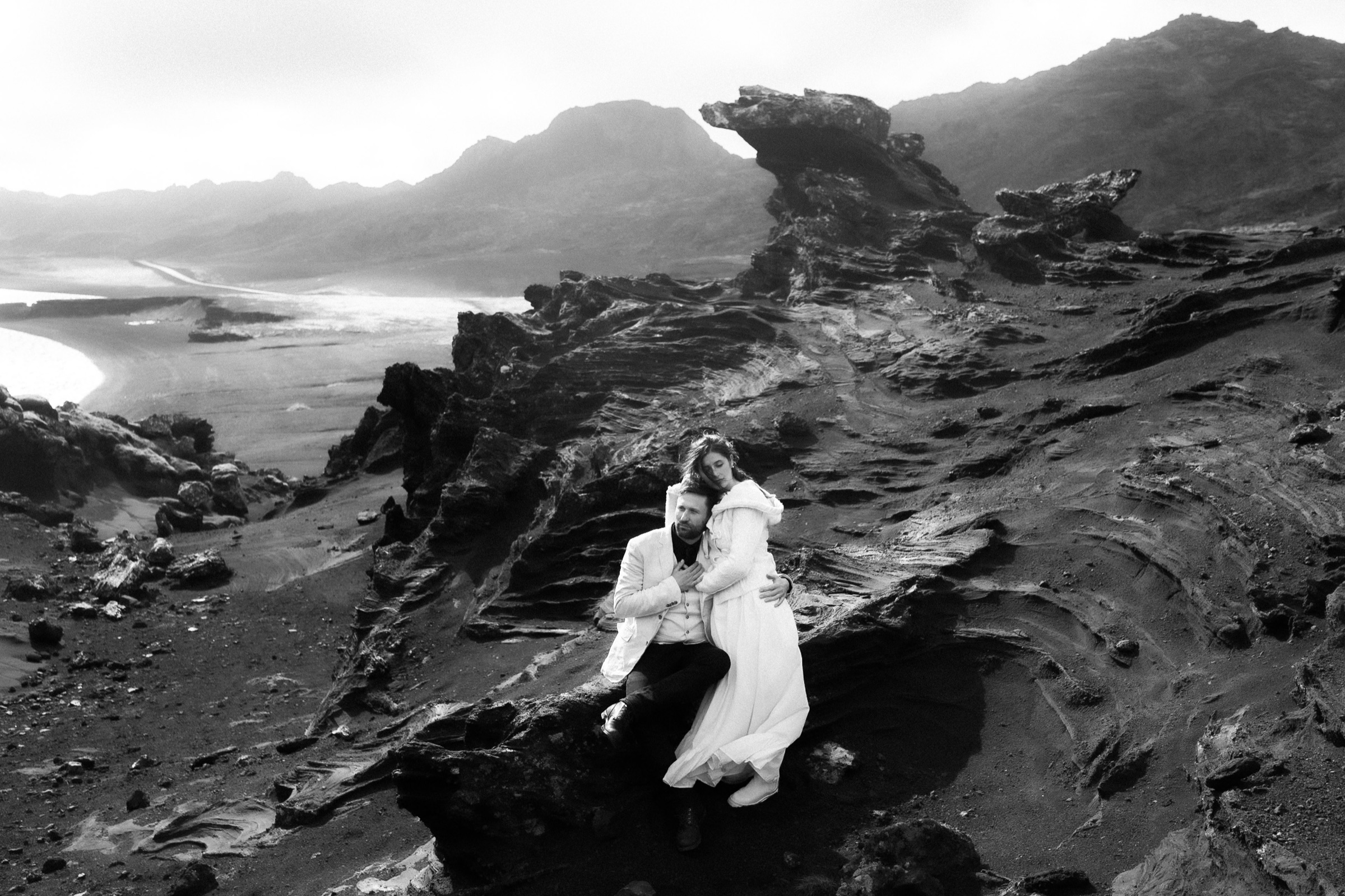 Iceland elopement photographer — couple portrait in dramatic landscape